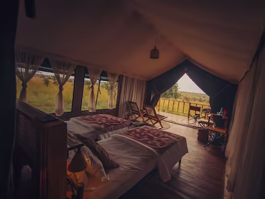 Tent interior at dusk looking out to the plains
